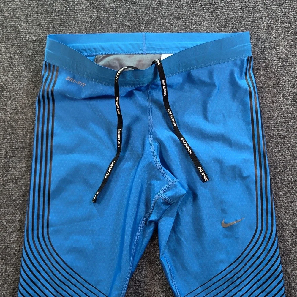 Nike Dri-FIT Running Leggings Women Medium Blue Striped Cropped RN56323
